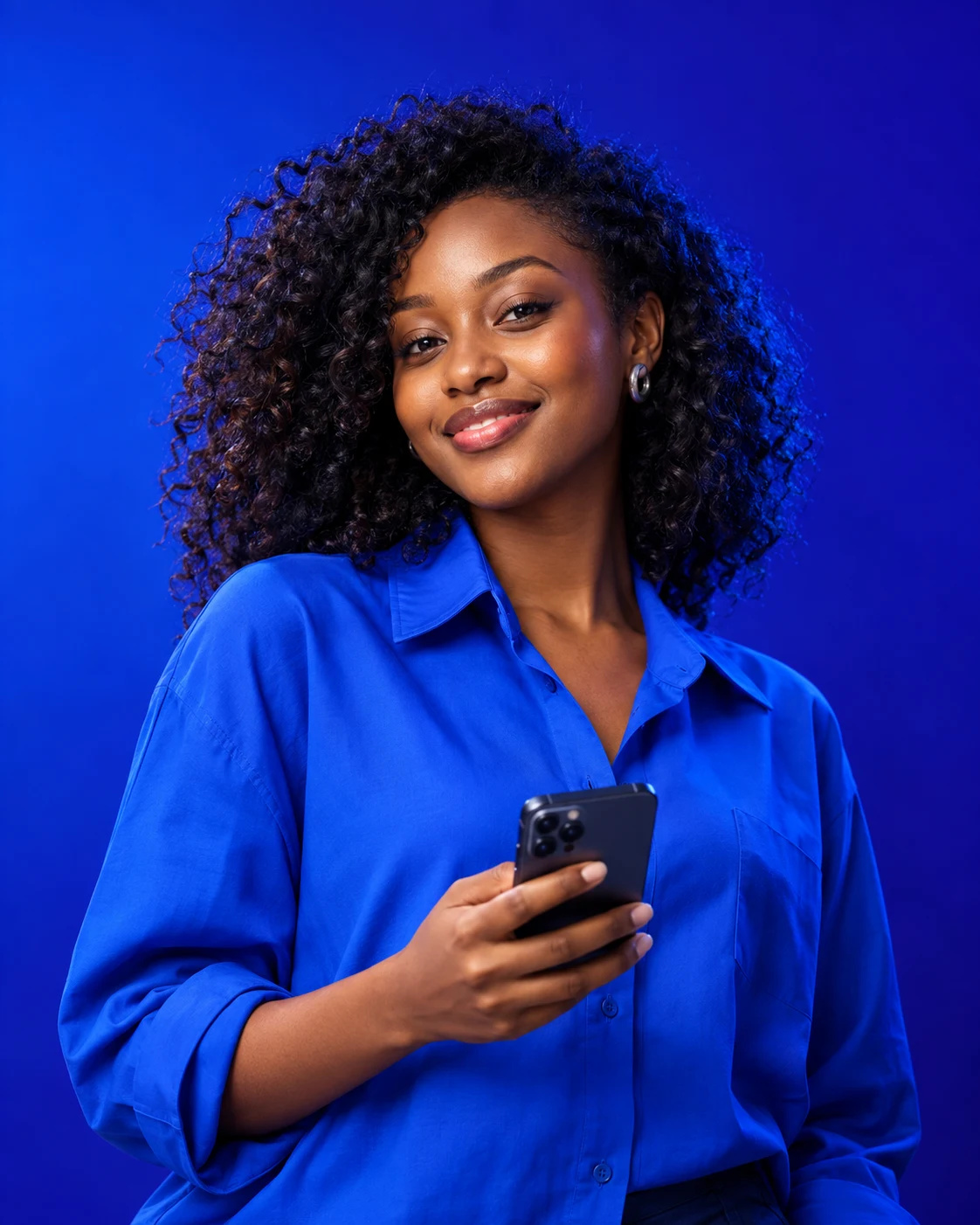 Woman creator holding a smartphone